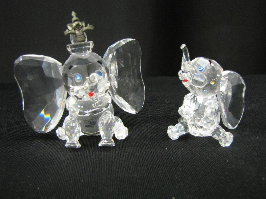 Two Disney Crystal World Figurines: Two Disney Crystal World Figurines depicting: Dumbo and Dumbo with mouse and hat, 3-4" tall, with original boxes