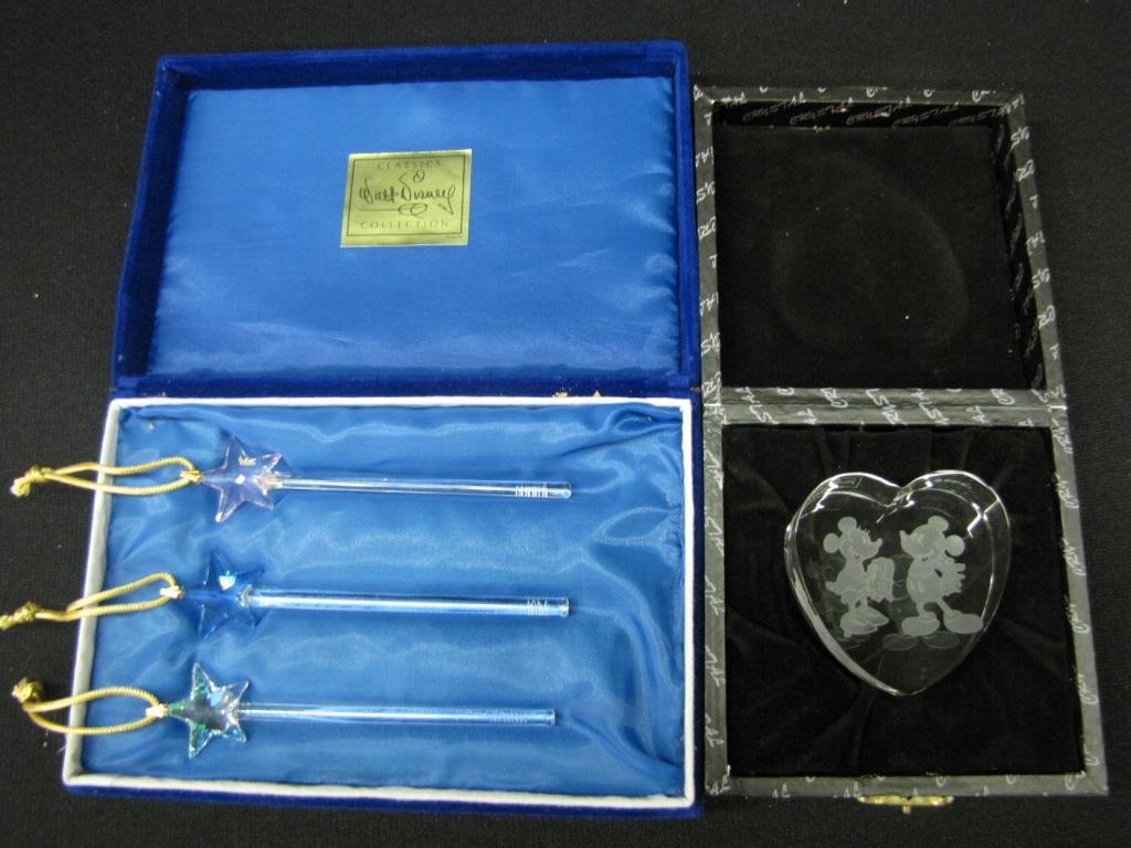Group of Disney Crystal Pieces: Group of Disney Crystal Pieces including: Three crystal wands entitled "Beauty", "Love" and "Health" and etched glass paperweight depicting Mickey and Minnie, 2"-5" long, with original cases