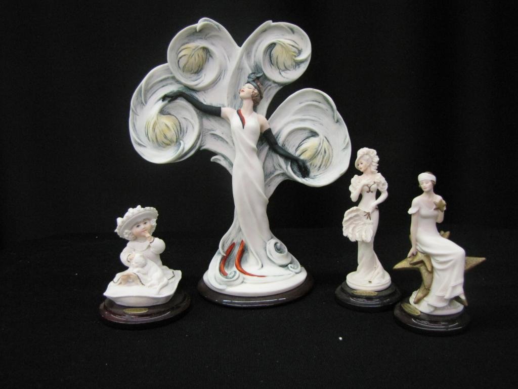 Four Armani Porcelain Figurines: Four Armani Porcelain Figurines including: "Starr", "Chantel", "Quiet please", and "Paradise Dancer", 3-8" tall, with original boxes