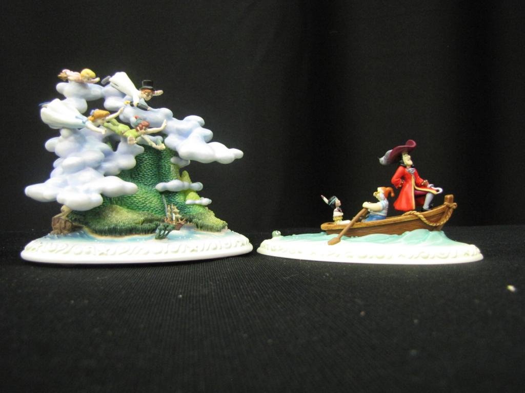 Two Olszewski Porcelain Figural Groupings: Two Olszewski Porcelain Figural Groupings depicting scenes from Peter Pan, 2-4" tall, with original boxes