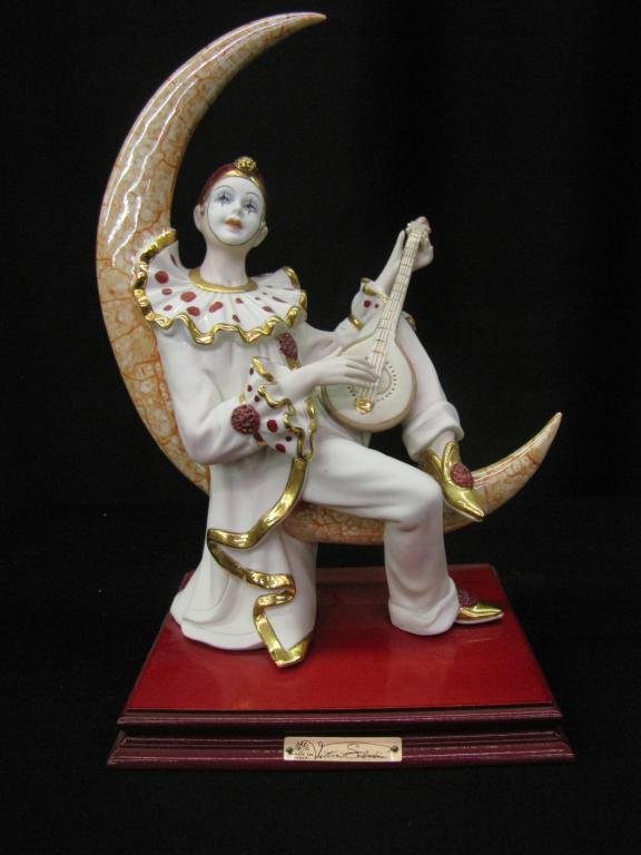 Vittorio Sabadin porcelain Figurine: Vittorio Sabadin porcelain Figurine depicting Clown playing mandolin on the moon, 13" tall, without original box