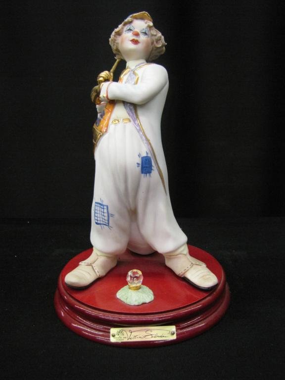 Vittorio Sabadin porcelain Figurine: Vittorio Sabadin porcelain Figurine Depicting clown golfing, without original box