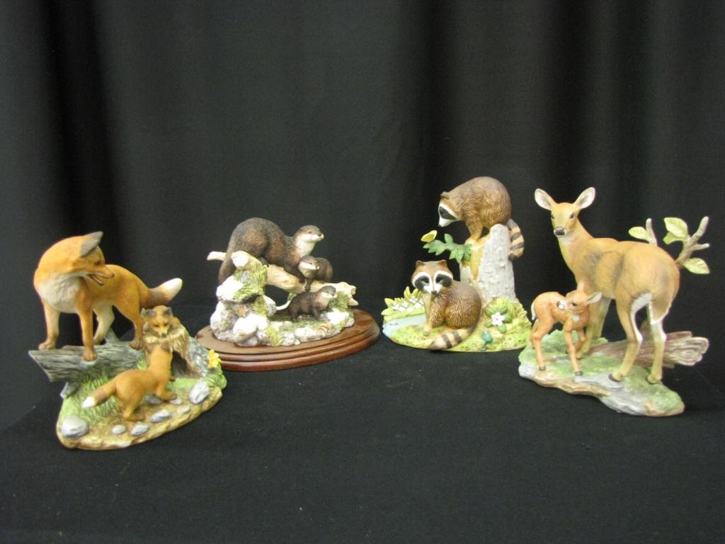 Four Porcelain Animal Figural Groupings: Four Porcelain Animal Figural Groupings including: three Maruri "Red Fox Family", "Deer Family", and "Raccoon Family", and one entitled "Late Thaw", all 6-7", All but "late thaw" with original boxes (