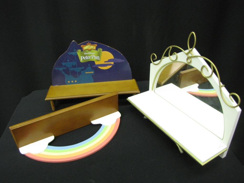 Group of Three Disney Stands: Group of Three Figurine Stands including one with mirrored back, one with rainbow, and Peter Pan stand, 12x7-11"