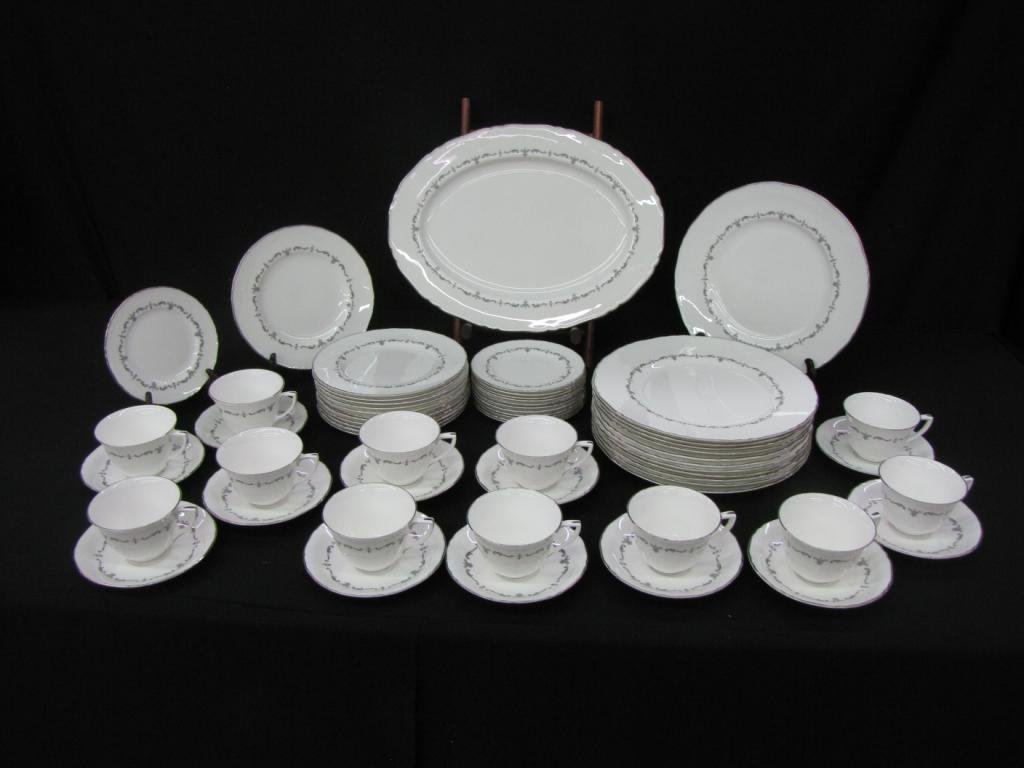 Sixty One Piece Set of Royal Worcester Bone China: Sixty One Piece Set of Royal Worcester Bone China of silver chantilly pattern including: one serving tray, twelve dinner plates, twelve salad plates, twelve desert plates, twelve cups with twelve sauc