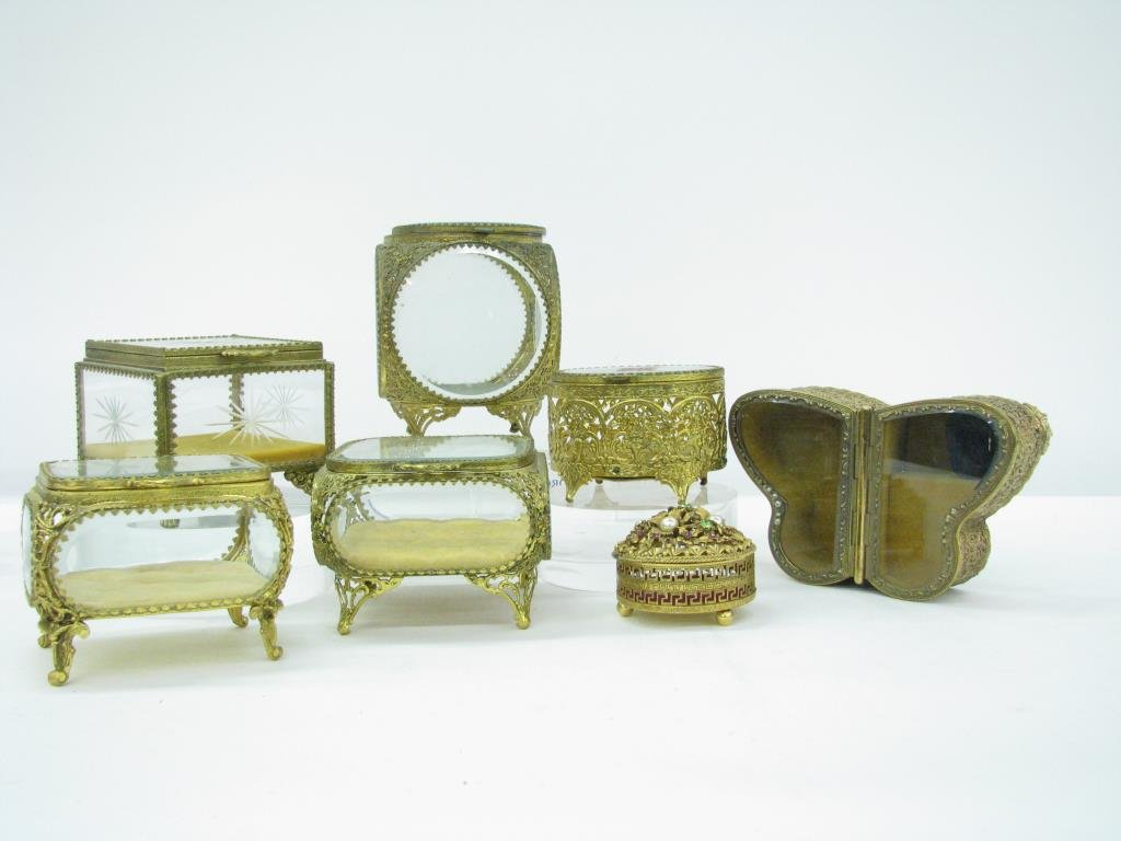 Group of Vintage and Antique Jewelry Caskets: Group of vintage and antique jewelry caskets, including one divided butterfly style jewelry box, all with gilt metal frames and beveled glass