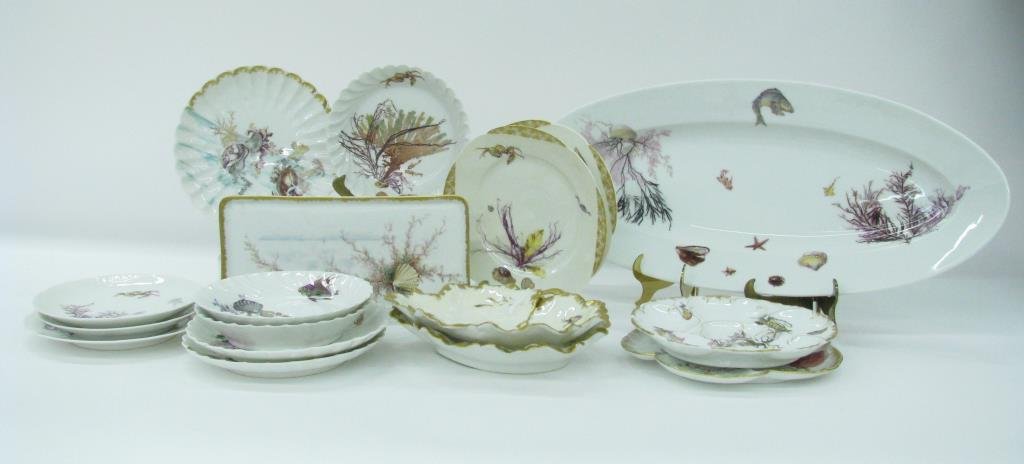 Group of Sea Life Decorated Porcelain: Group of Haviland, Limoges and other brand porcelain, seventeen items, all with sea life painted decoration, including fish serving platter 23.5 x 10, includes two oyster plates, fruit bowls, etc.