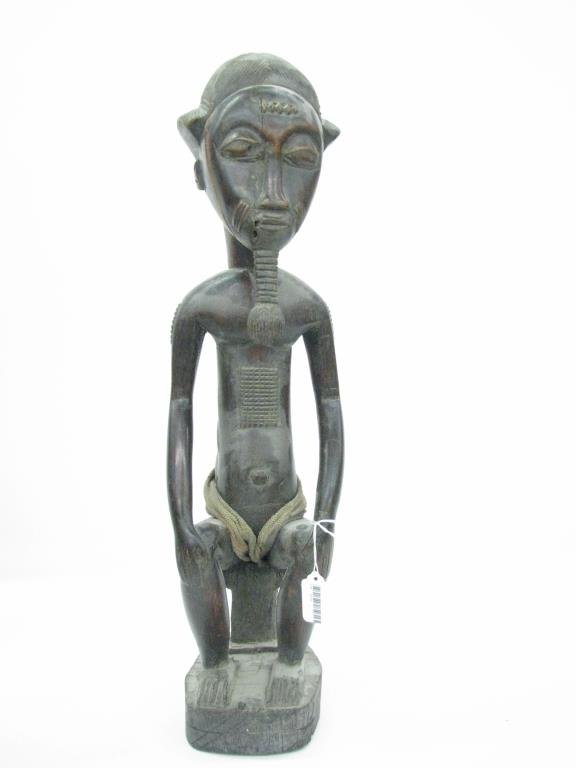 Baule African Tribal Male Figure: An African tribal male figure, carved wood, Baule (Baoule, Bawule) tribe, 23.5H, carved hair and beard