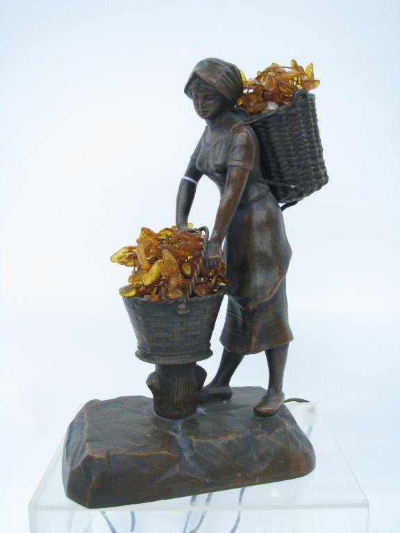 Vintage Bronze Figural Table Lamp: Vintage Bronze figural table lamp, depicting a woman carrying bushel on her back, with amber-colored beads shading lamps in baskets, 13" high