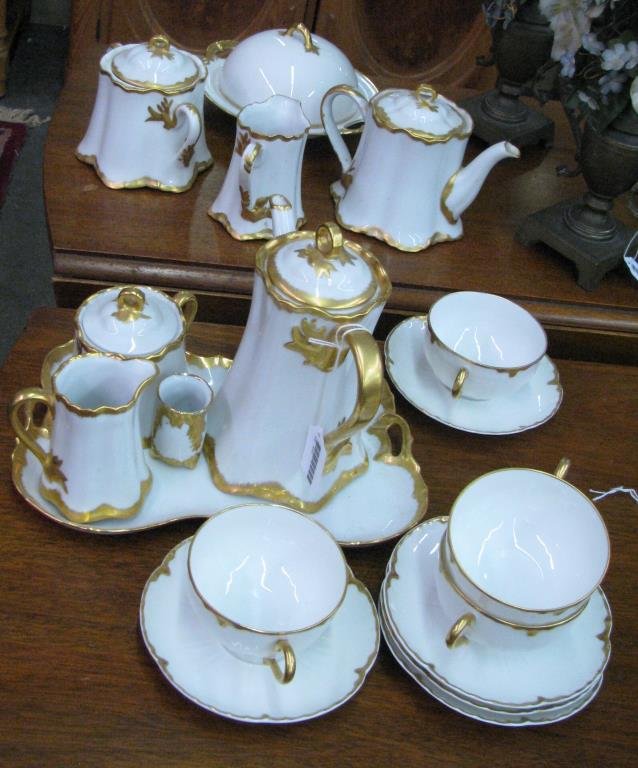 Group of Porcelain Dinnerware, Haviland: Group of white porcelain dinnerware, various makers, including Haviland and Hutschenreuther, all with gold trim, 18 pieces total