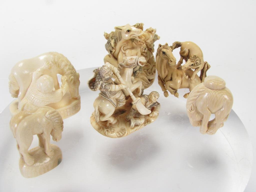 Group of Ivory Oriental Carvings: Group of six Oriental ivory carvings, including two netsuke, four carved miniatures including man with horse, (2) standing horse figures, and horsemen grouping