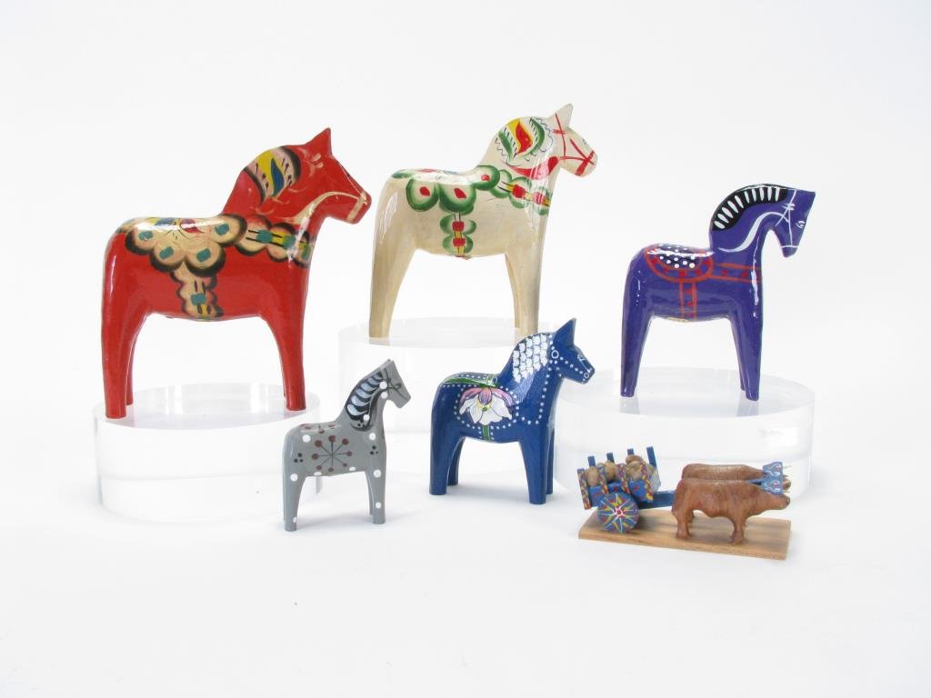 Five Swedish Dala Horses: Five Swedish Dala horses including small gray horse signed and dated 1993, red horse incised with letter H, white horse, blue horse by John Gudmunds number 465, blue horse initialed and dated 2006; al
