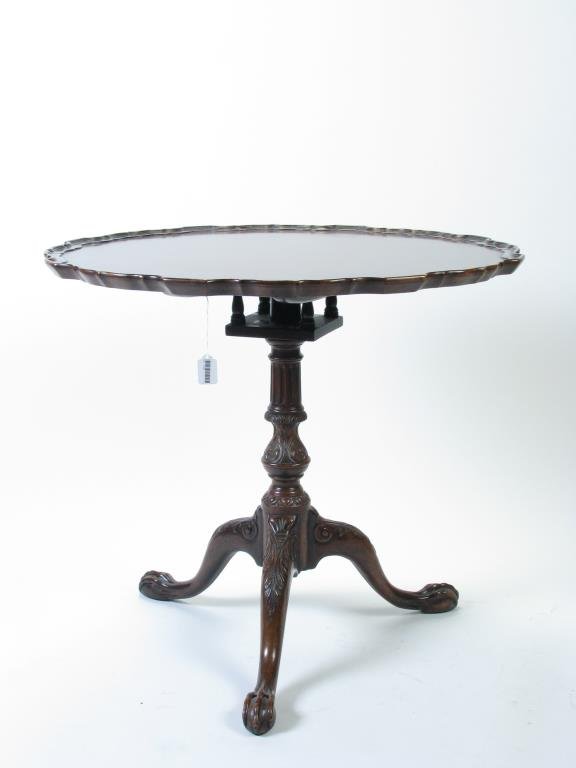 Bird Cage Tilt-Top Antique Table: An antique mahogany bird cage tilt-top table, with pie crust edge top, ball and talon foot, ca early 20th century, 32" dia x 28h