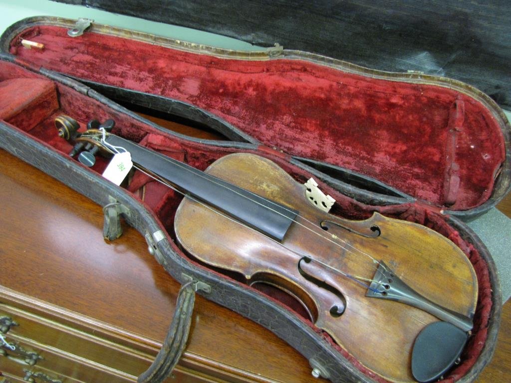 Antique Violin with Case: Antique violin, marked inside Carlo Tononi, Bolognese, Italy, with case, no bow, the violin is 23" in length. The body is 13 3/4x7 1/2. The case is 31 1/4" long.