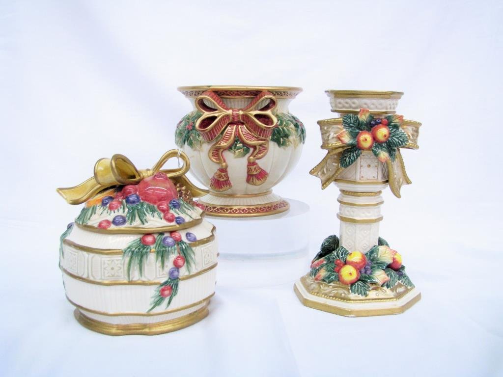 Fitz and Floyd Holiday Motif Pottery: Fitz and Floyd holiday motif pottery, three pieces total, including candle holder, 8.25" tall, candle stand and lidded jar