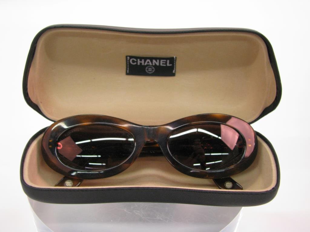 Chanel Tortoise Shell Sunglasses: Chanel Tortoise Shell Sunglasses with oval black lenses in hard Chanel case. Style 5007 C533/93