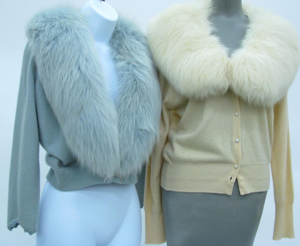 Two Vintage Cashmere sweaters: Two vintage cashmere sweaters with fur collars: 1. Cream color button down sweater with removable white fur collar 2. Dalton pale blue cashmere sweater with Heynard dyed blue fur trim and ornate rhine