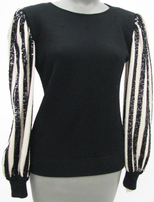 Valentino Night Vintage Black Sweater: Valentino Night vintage black sweater with white long sleeves with black sequined stripes. Original Price Tag $890. Size Small