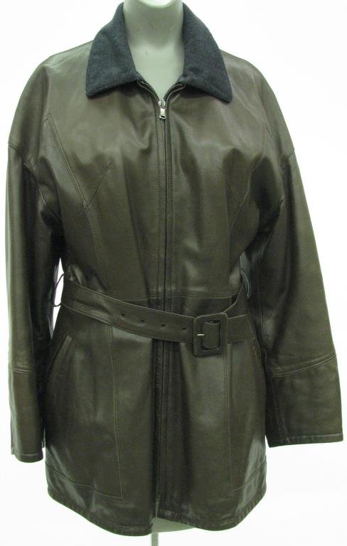 Barney's New York Brown Lamb Skin Jacket: Barney's New York brown lambskin zip front jacket with belt at waist. Zippers at sleeve cuffs and two slat front pockets. Lined in gray fabric. Made in Italy. Size Med
