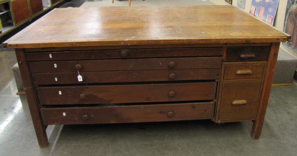 Harry Davis Artist Studio Desk: Desk used in the studio of Harry Davis, drawing desk with tilting top, 8 drawers including five large sheet drawers, 72x44x34h, selling from Davis estate