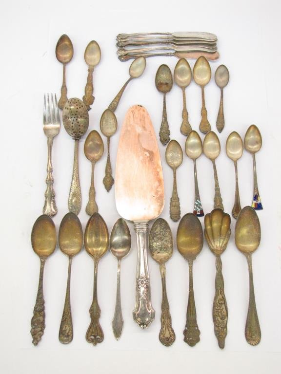Group of Assorted Sterling Tableware: A group of assorted sterling silver tableware, including 23 assorted sterling spoons, forks and collector spoons, tea strainer and a cake server, set of six butter knives, approximately 31 items total