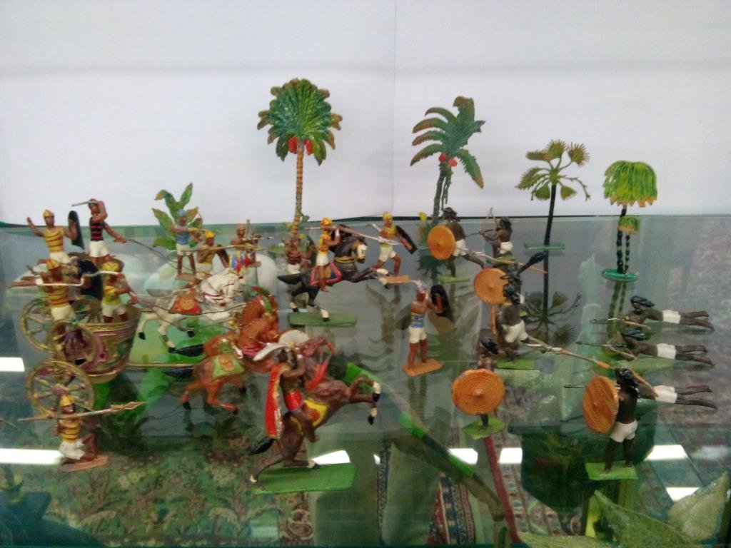 Group of Lead Soldiers and Accessories: Group of Lead Soldiers and Accessories, 26 pieces total including: nine Egyptian soldiers with bows, spears and knives, 2 Egyptian war chariots with two soldiers and horses each, nine African fighters