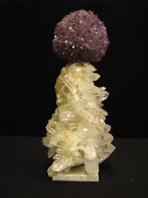 Amethyst and Quartz Crystal Cluster Sculpture: Amethyst and Quartz Crystal Cluster Sculpture, by lapidary artist Leo Atkinson (American, active), raw quartz crystal cluster bottom section with large defined crystal points, round amethyst crystal c