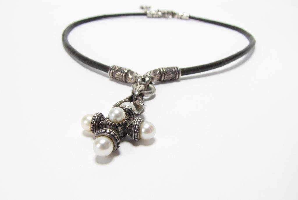 Scott Kay Sterling Cultured Pearl Pendant: A Scott Kay sterling silver cross pendant with five 4.5mm to 5mm cultured pearls, attached to a dark brown cord