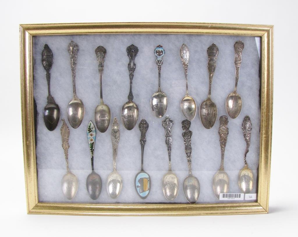Collection of Vintage Sterling Souvenir Teaspoons: Collection of Vintage Sterling Souvenir Teaspoons in glass shadow box, various landmarks and subjects, 5"-6" long, case is 17" x 13" x 1.5"