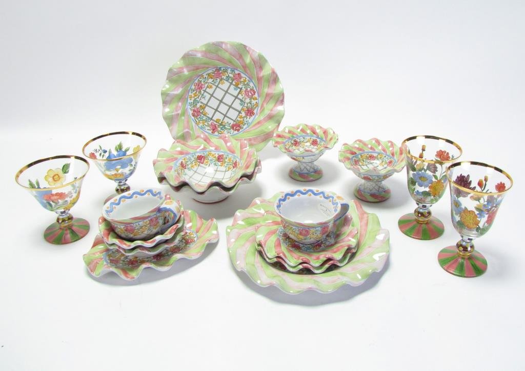 Group of Mackenzie Childs Pottery: A group of Mackenzie Childs pottery, including two 11" dinner plates, 2 cups and saucers, two soup bowls, two dessert bowls, two pedestal compotes, butter dish, four pedestal (2 and 2) stems