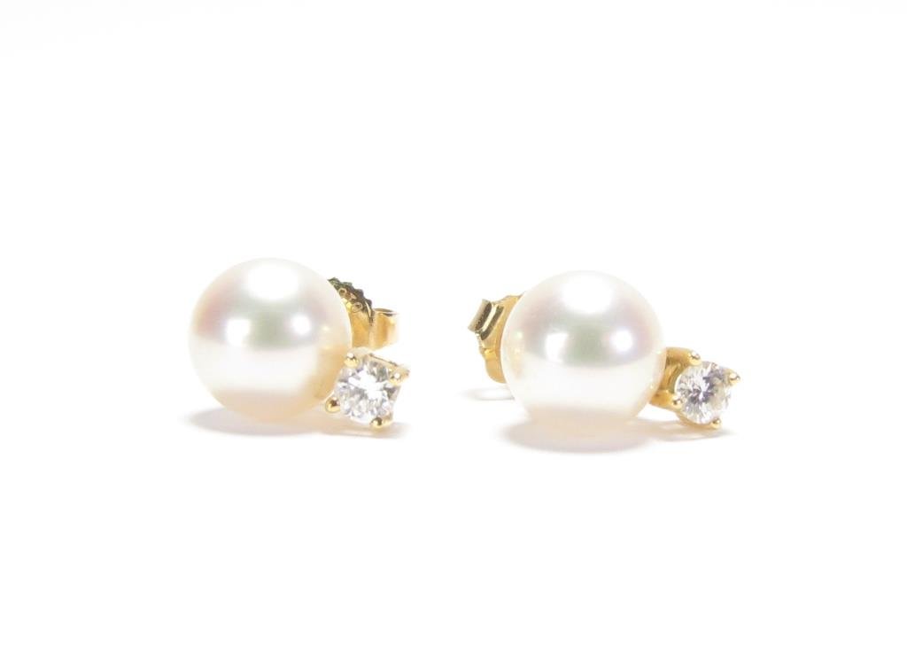 18K Yellow Gold Mikimoto Pearl, Diamond Earrings: A pair of Mikimoto earrings each with approximately 7.8mm pearls and accent diamonds, 1.8dwt, with red Mikimoto earring box