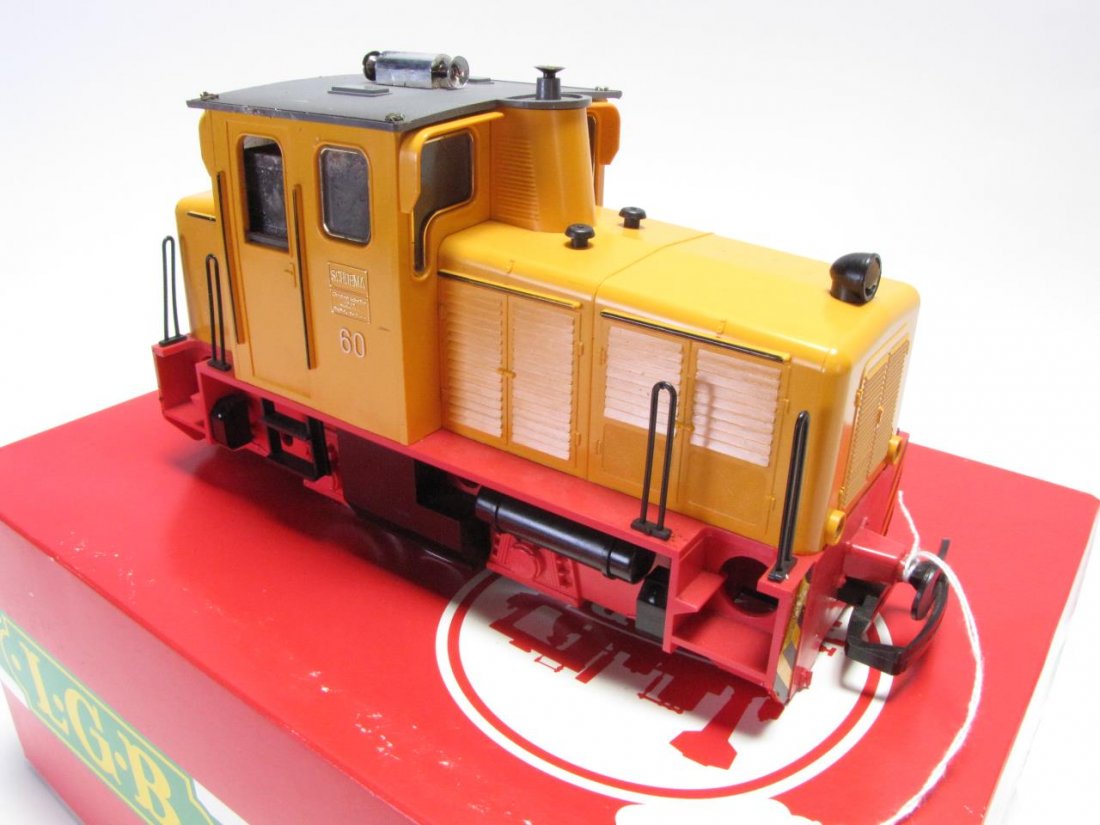 LGB G Scale #2060 Schoema Diesel Loco with Horn: LGB G Scale #2060 Diesel Locomotive with Horn, yellow in color, #60 and "Schoema" on sides, measuring 10" in length, locomotive appears to be inoperable with smoke and soot damage throughout, with ori