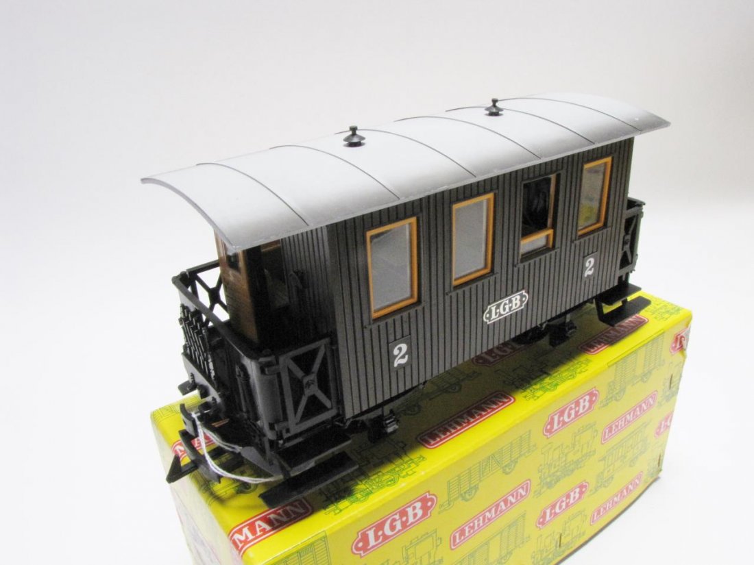 LGB G Scale #3010 4-Wheel Passenger Car: LGB G Scale #3010 4-Wheel Passenger Car, brown in color, with #2 on the sides, one LED light, measuring 11" in length, with non-matching #3010 box
