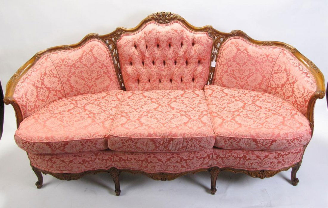 Antique French Style Sofa: An antique, ca 1920's, French style sofa, with reticulated carved walnut frame, button tufted back cushion, quality upholstery, good condition, 78"l