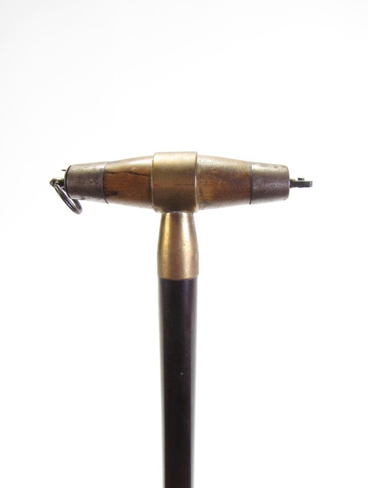 Continental Sailor's Knife Cane: Continental Sailor's Knife Cane, solid wood shaft, barrel form handle with pocket knife located inside, pocket knife is revealed when key ring is pulled from handle, knife is marked "P.Holmberg, Eskil