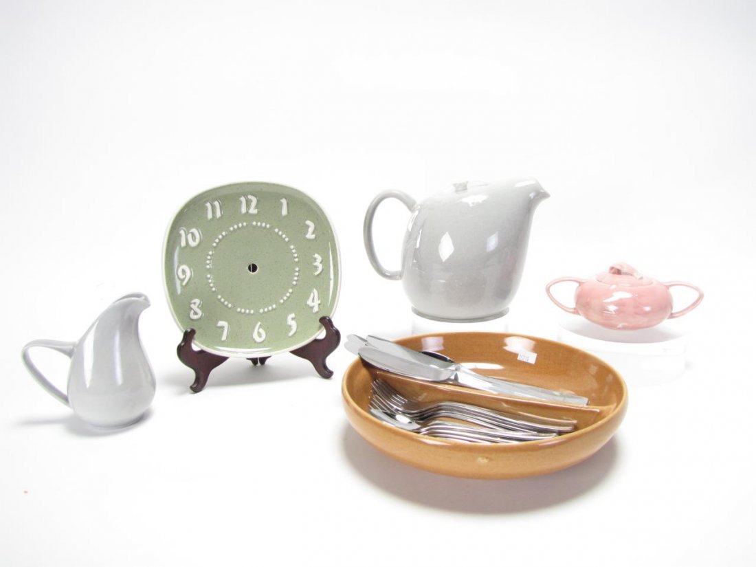 Group of Russel Wright Porcelain and Silverware: Group of Russel Wright porcelain and silverware including: divided bowl, pitcher with lid and clock face; 18 piece Russel Wright silverware by Oneida including four each: teaspoons, tablespoons, dinne