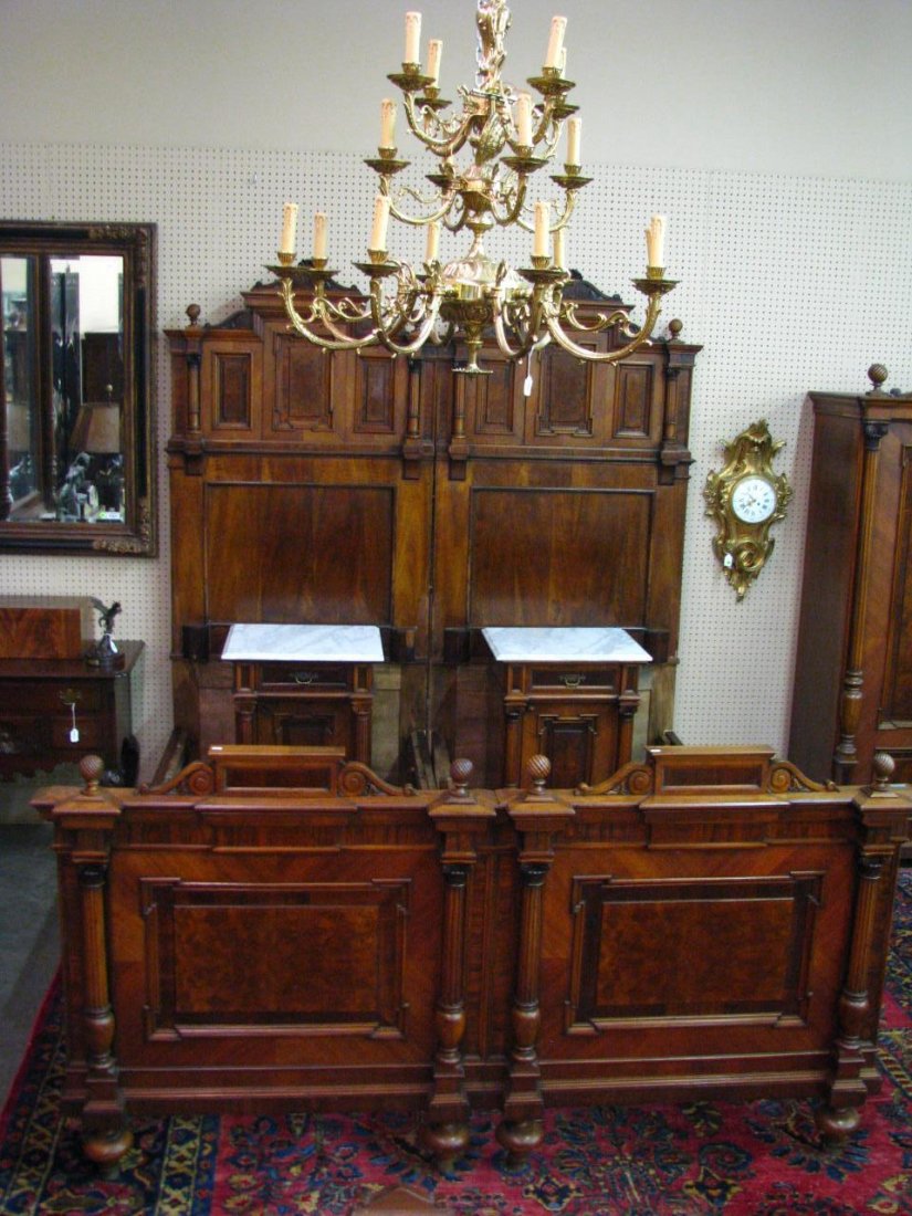 Austrian Victorian King-Size 5PC Bedroom Group: An antique Austrian Victorian bedroom group, two former twin beds professionally converted to be joined and accommodate king bedding, including two marble top night stands, marble top dresser and larg