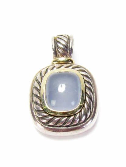 Yurman 14K and Sterling Albion Moonstone Enhancer: A David Yurman 14K and sterling silver Albion Collection enhancer with cabochon moonstone, stone approximately .45" x .38"; pendant approximately 1.125" x .75"