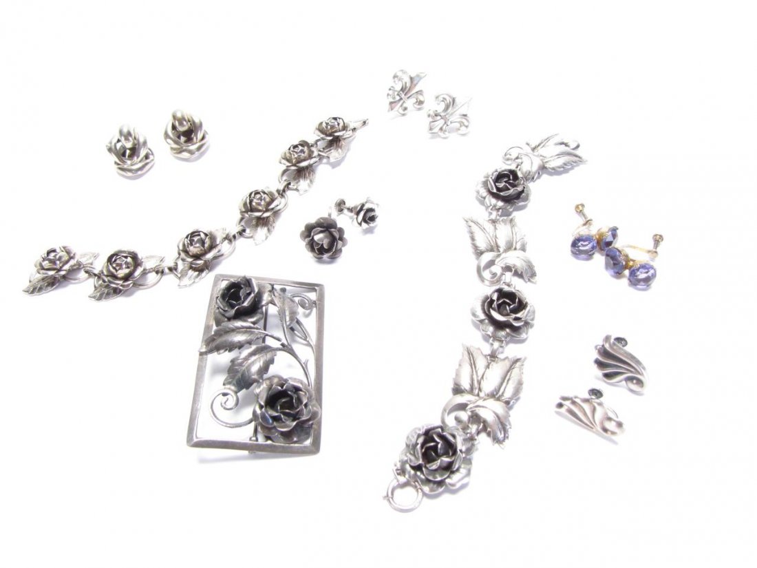 A Collection of Sterling Jewelry: A Collection of Sterling Jewelry including six pair of clip and screwback earrings (one pair is Ballou, ca. early1930's, not marked sterling); one sterling rose design bracelet; one unmarked rose desi