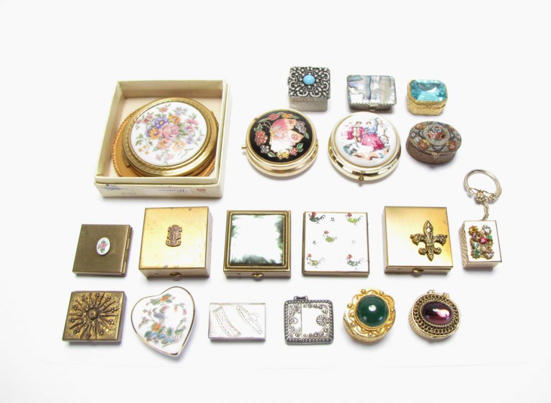 Nineteen Pill and Powder Boxes (Limoges): Seventeen pill and powder boxes including Carene England porcelain compact; chain hinge pill tin; two Mexican sterling; one porcelain Wedgwood bone china; one with Flair Fifth Avenue sticker; one with