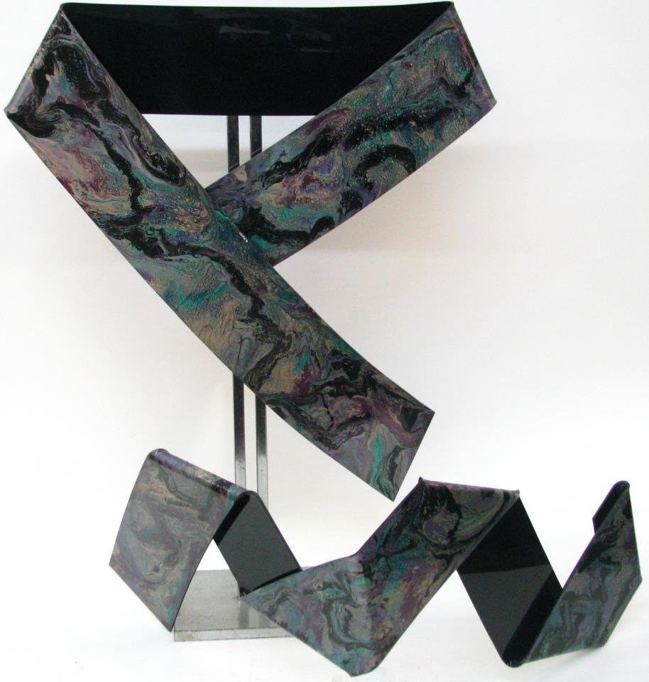 Two Acrylic Wall Sculptures, Richard Mann: Two wall sculptures, acrylic with acrylic painted decoration, by California artist Richard Mann (20th century), one is shape of folded ribbon, 41 x 44" (3"deep); and the other is designed to wrap a 90