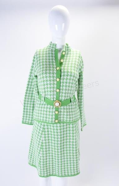 St. John Knit Vintage Houndstooth Suit: St. John Knits vintage green and white hounds tooth suit. Jacket has tab style collar and eight buttons down front and green belt. Skirt is pull on A-line style. Estimate Size Small