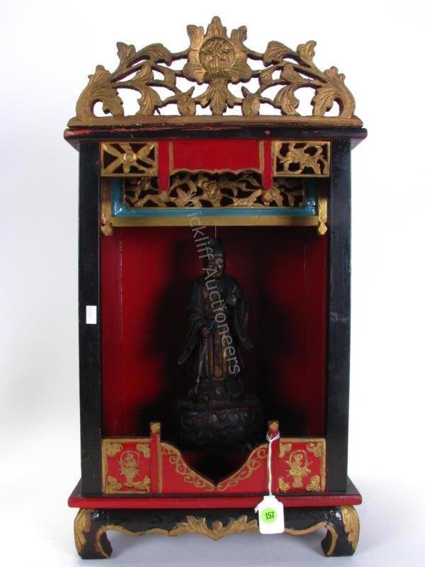 Wood Carved Oriental Statue and Shrine: Wood Carved Oriental Statue and Shrine, hand carved statue of wise man in robes, red and gold painted decoration; shrine with black, red and gold painted decoration, pierced carvings at top, carved fl