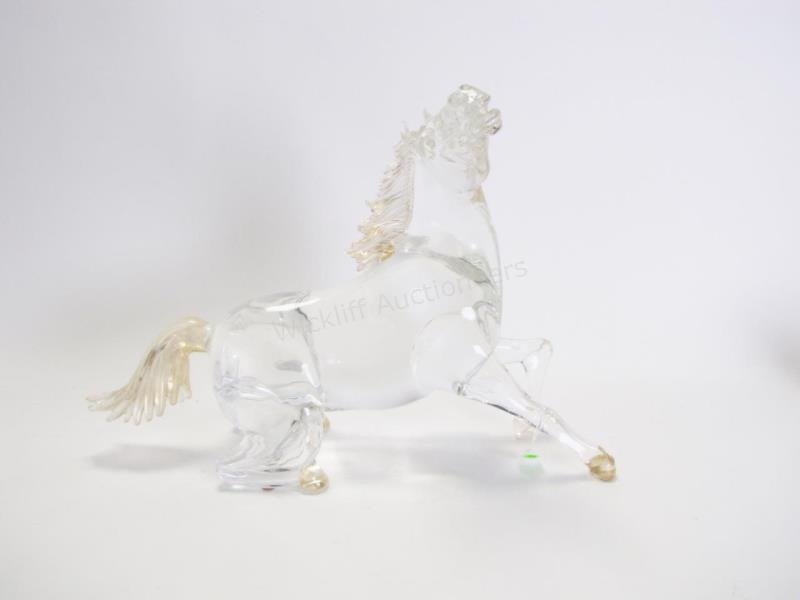 Arnaldo Zanella Murano Art Glass Horse: Large Artist Signed Murano Art Glass Horse, in kneeling pose, clear body, mane, tail and hooves with gold flake decoration, signed on underside "Arnaldo Zanella", 24" x 10" x 16.5" tall
