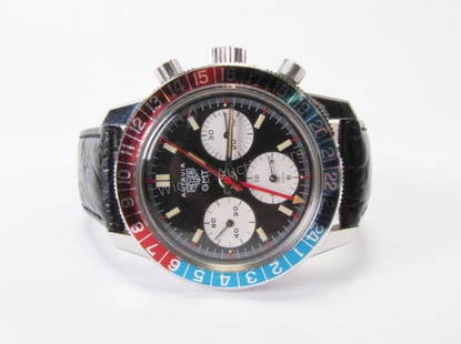 Vintage Gent's Heuer Autavia GMT Watch: A vintage gentleman's Heuer Autavia wristwatch, GMT chronograph movement, ca 1960s, 17-jewel manual-wind movement, black dial with white subdials, two-tone bezel Condition: good, currently running, re