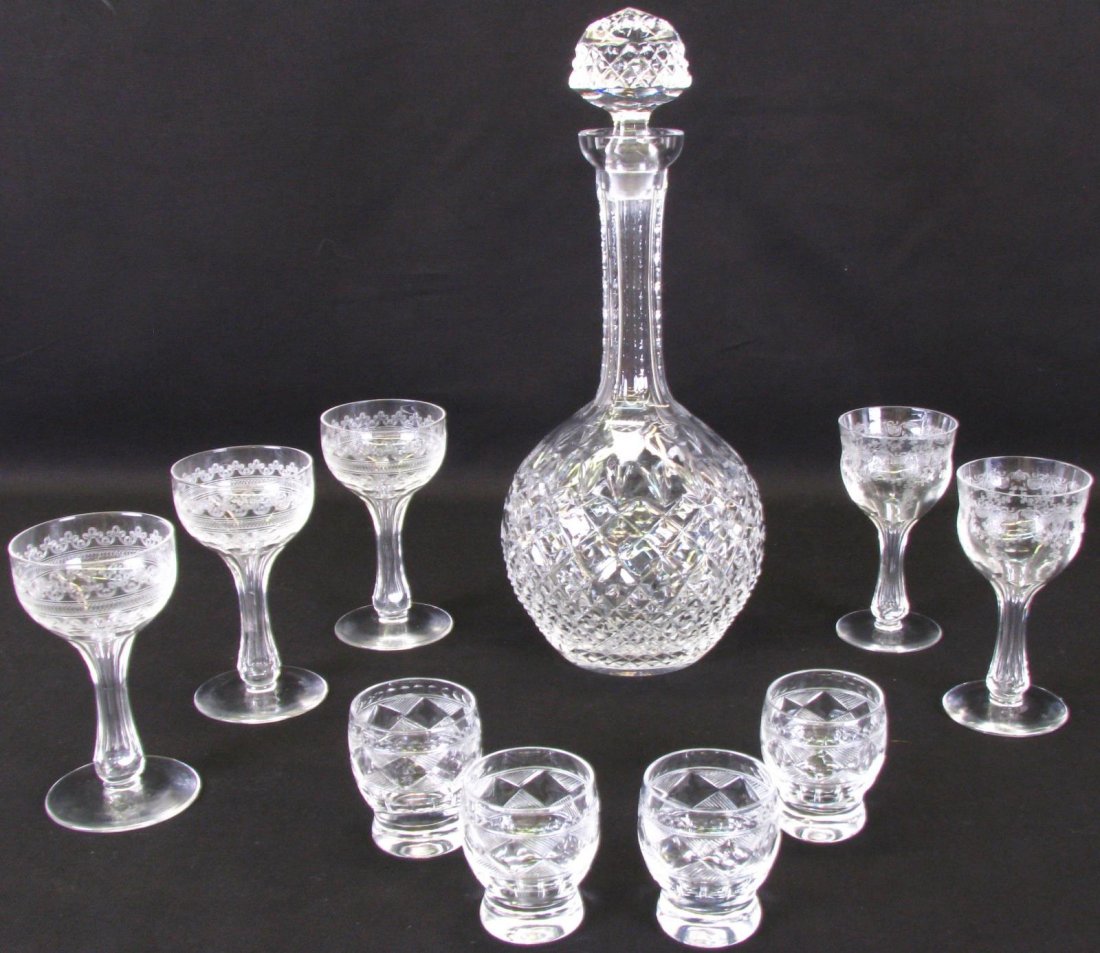 Group of Crystal Glasses and Decanter: Group of Crystal Glasses and Decanter, nine glasses including: set of four Thomas Webb English cut crystal cordials; three hollow stemmed sherry glasses with etched decoration; two hollow stemmed dese