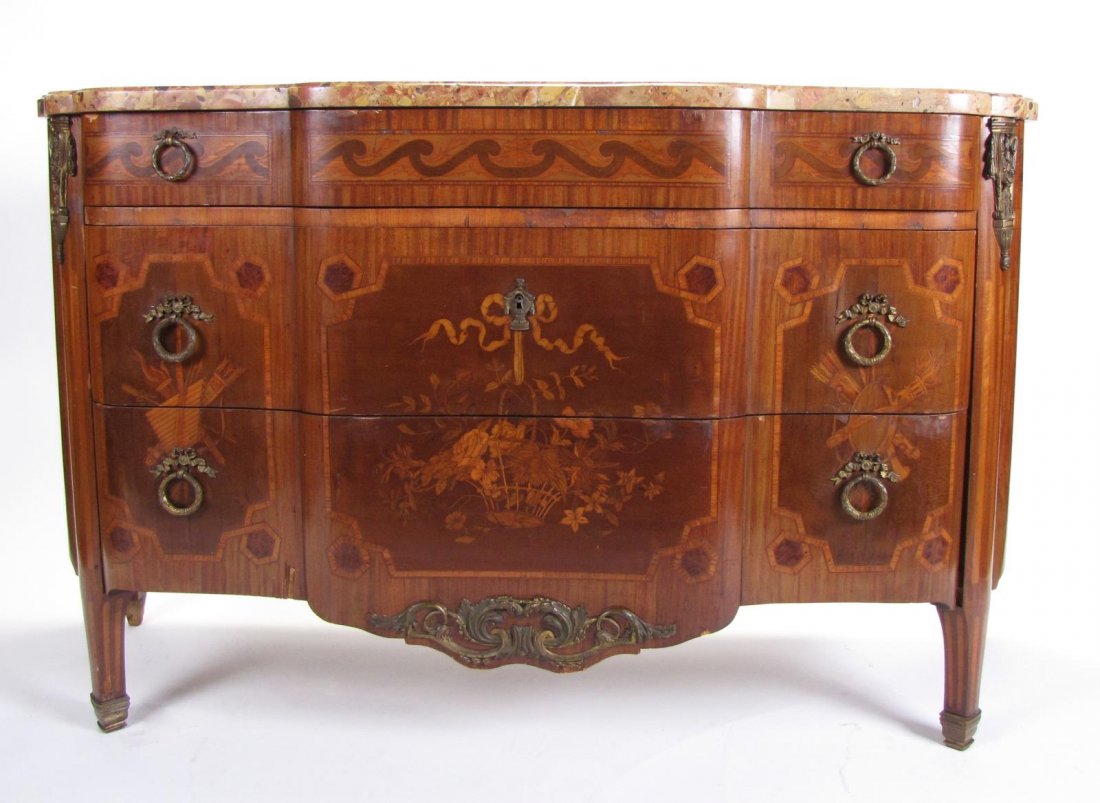 Louis XVI Style French Commode: Louis XVI Style French Commode with flower basket design marquetry inlay and Flemish marble top, Circa 1900, three drawer, brass ring pulls, 32.5" tall, 22.5" deep, 60" wide