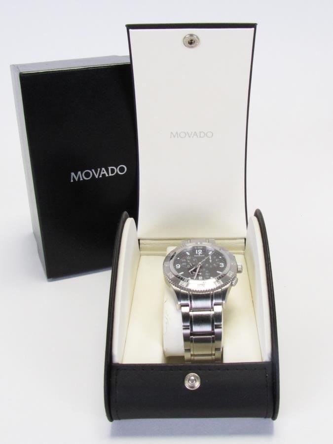 Gentleman's Movado Gentry Chronograph Watch: A gentleman's Movado Gentry chronograph wristwatch, black dial, 84 f9 1890, stainless steel case and bracelet, with box and papers