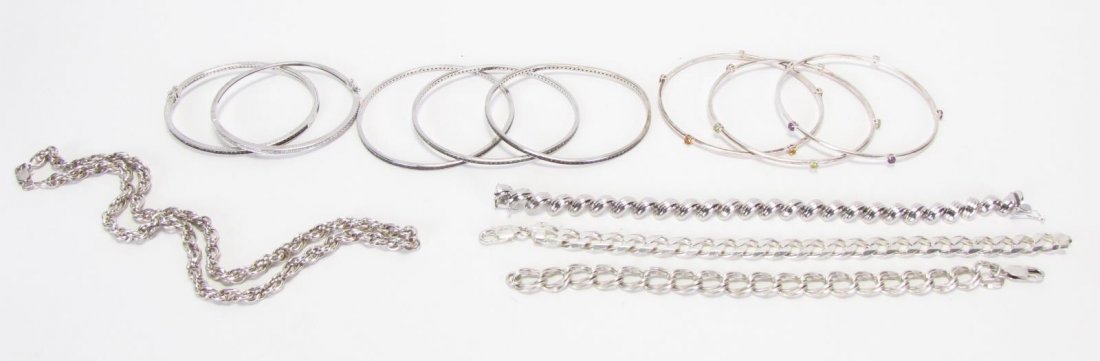 Twelve Sterling Silver Jewelry Items: Sterling silver .925 jewelry including eight bangle bracelets, three chain bracelets and one necklace, 114.5dwt