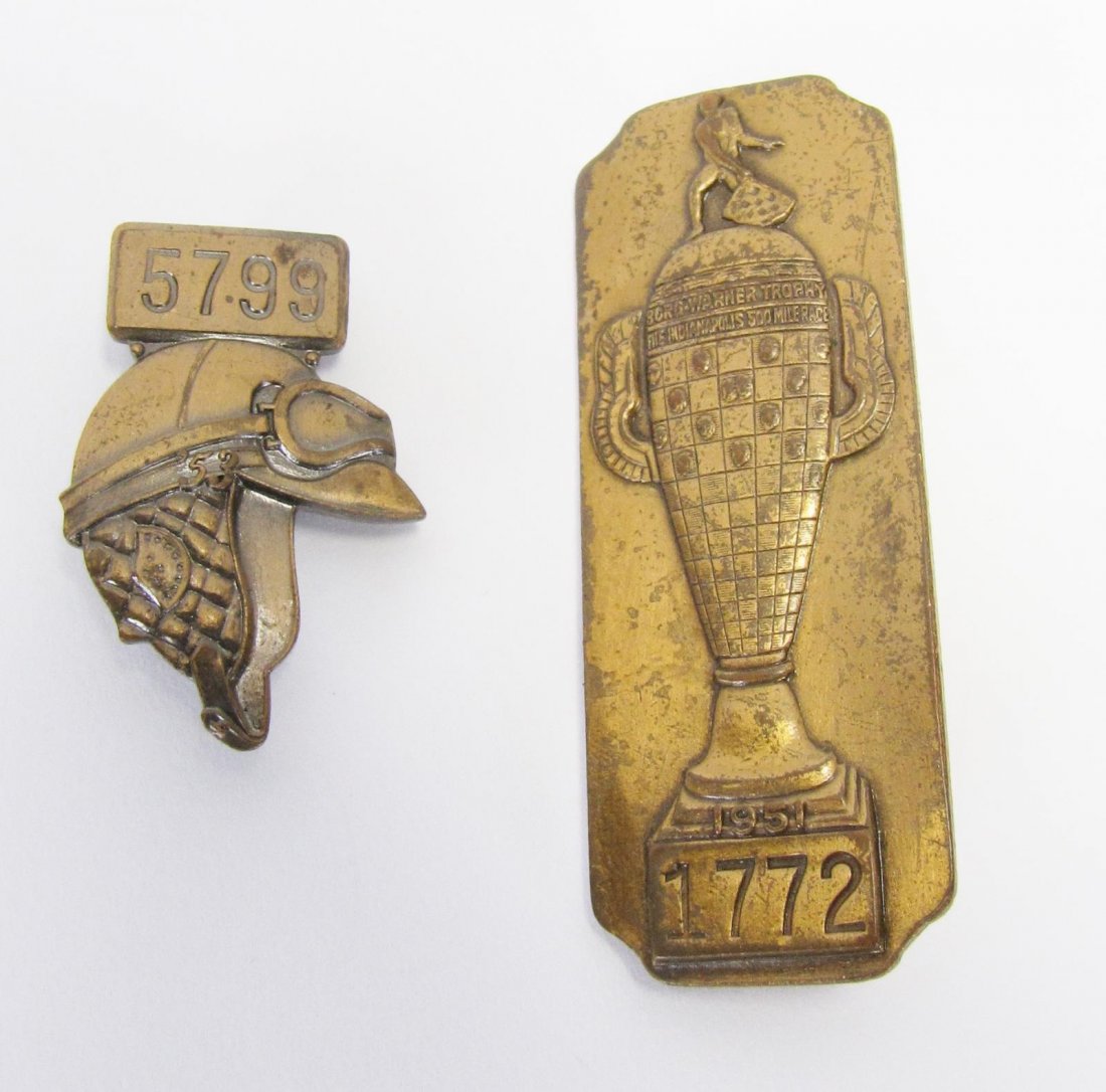 1951 and 1953 Indianapolis 500 Pit Badges: 1951 and 1953 Indianapolis 500 Pit Badges, 1951 bronze badge #1772 depicting Borg Warner trophy; 1953 bronze badge #5799 depicting a helmet; working clasps